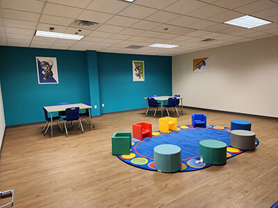 Children's story circle area with seating